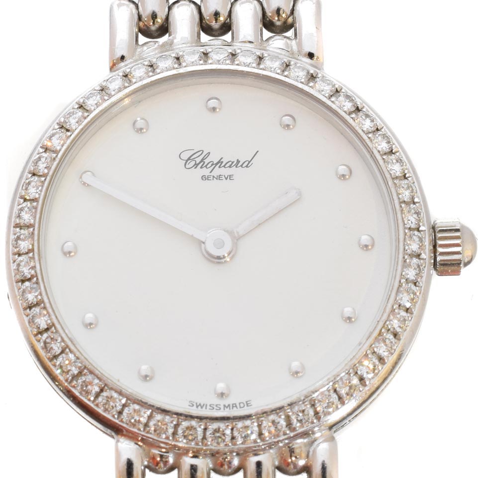 An 18ct gold diamond Chopard watch, the circular signed dial with dot hour markers, diamond set bezel and 18ct gold case numbered 478164, bearing Swiss assay marks, with fancy link bracelet and folding clasp, signed and numbered Chopard 10/5911, case diameter 21mm, gross weight 41.6g.